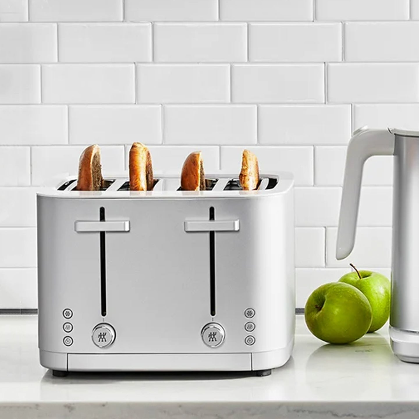 http://www.boroughkitchen.com/cdn/shop/products/zwilling-enfinigy-4-slot-toaster-silver-lifestyle-borough-kitchen.jpg?v=1633702610