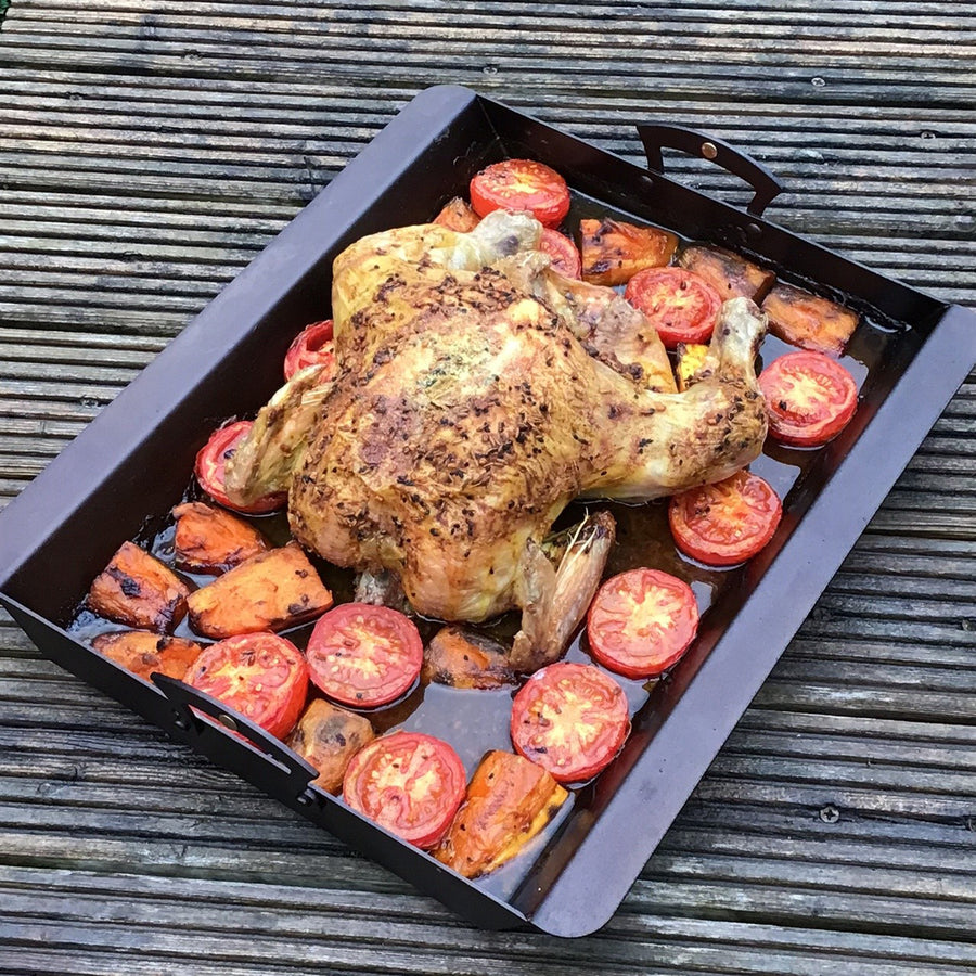 https://www.boroughkitchen.com/cdn/shop/products/netherton-foundry-roasting-pan-roast-chicken-borough-kitchen_900x900.jpg?v=1668764518