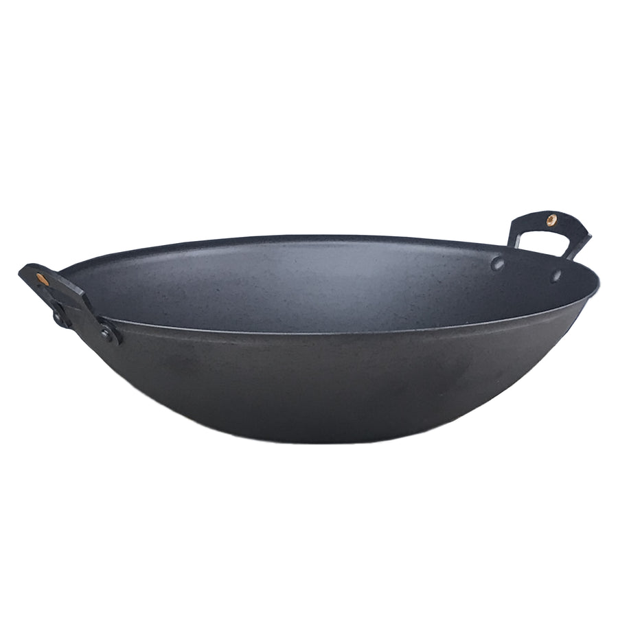 https://www.boroughkitchen.com/cdn/shop/products/netherton-foundry-wok-2-handle-no-lid-borough-kitchen_900x900.jpg?v=1659089406